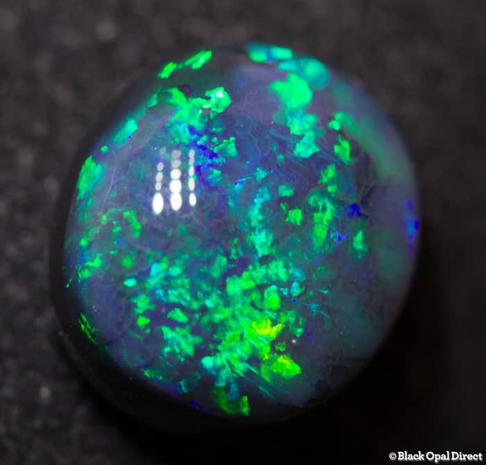 2.47 ct black opal 9.6x8.5x5mm
