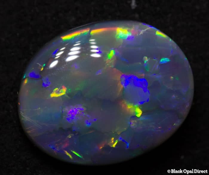 2.47 ct dark opal 11x9x4mm