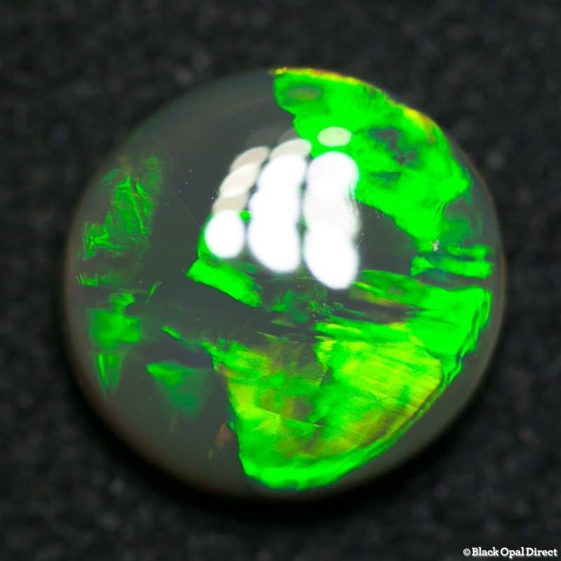 2.48 ct black crystal opal 10mm round x4mm