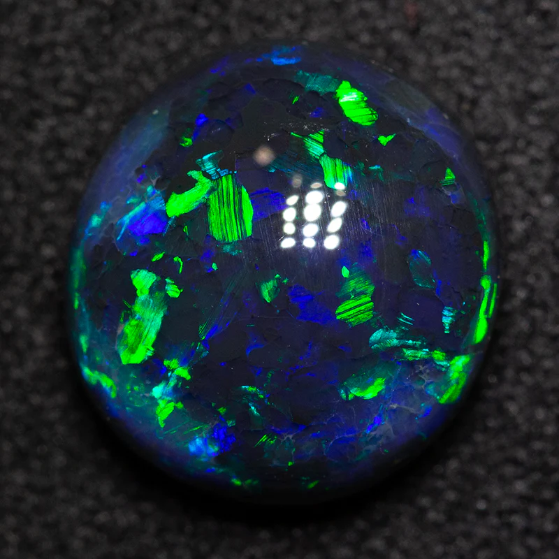 2.48 ct black opal 10x9x4.5mm