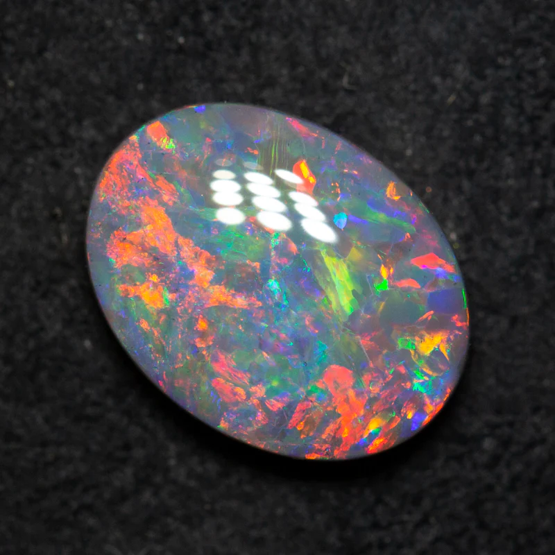 2.51 ct dark opal 11.3x8.5x3.8mm