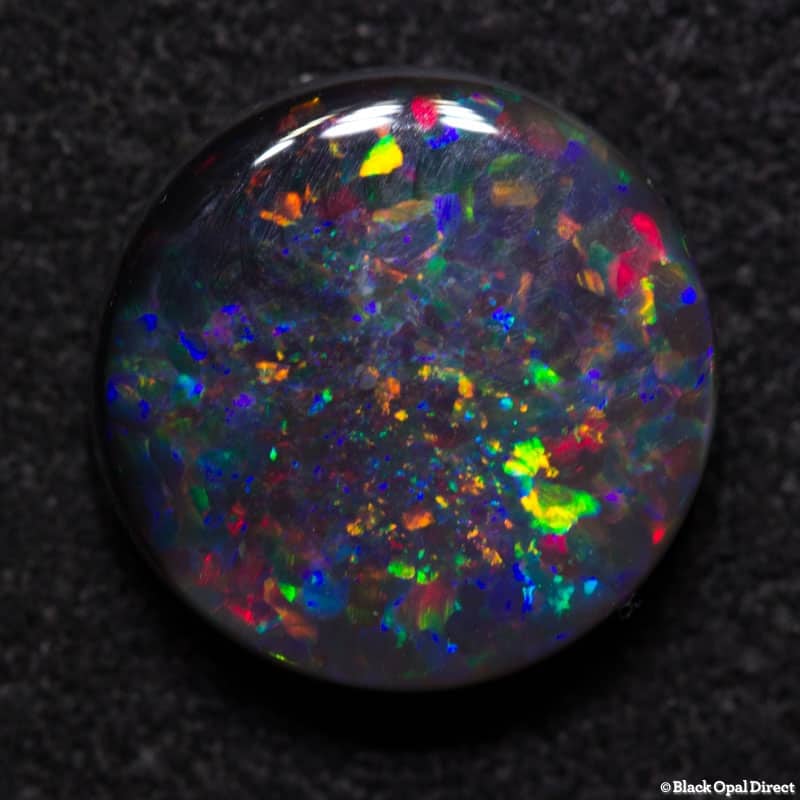 2.52 ct black opal round 10mm + 1.03ct 5mm round opal pair