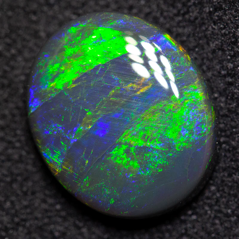 2.55 ct black opal 11.1x9.3x3.4mm