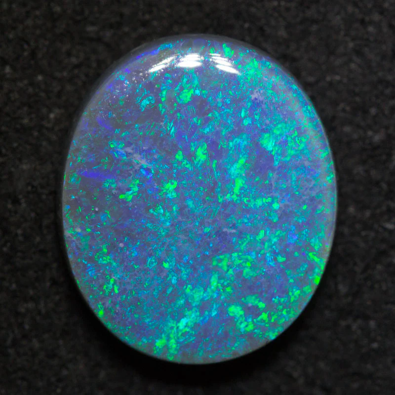 2.56 ct black opal 11.3x9.6x3.4mm
