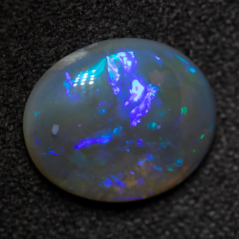 2.60 ct dark crystal opal 11.7x9.7x3.6mm
