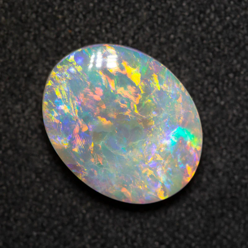 2.62 ct dark opal 11.8x9.4x3.7mm