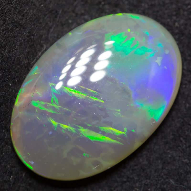 2.66 ct dark opal 13.6x9.3x3.3mm