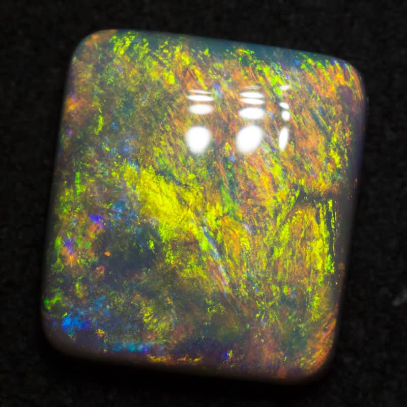 2.70 ct black opal 9.4x8.5x3.8mm