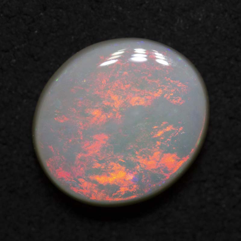 2.70 ct dark opal 10.9x9.8x3.7mm