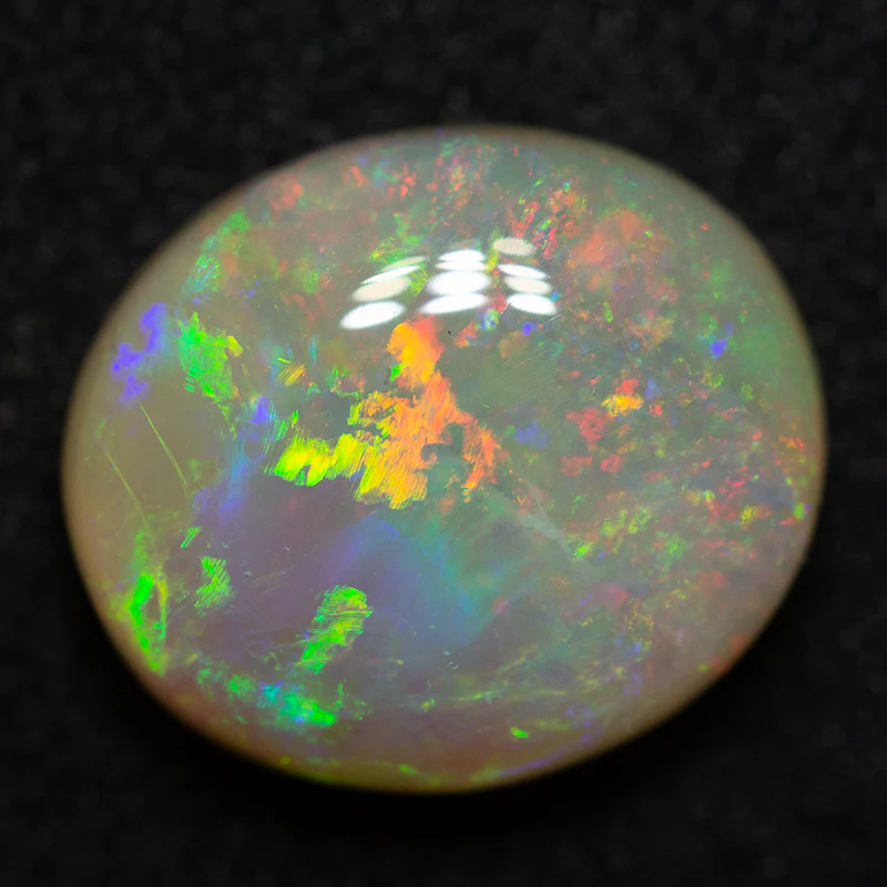2.70 ct white opal 10.3x9x4.6mm