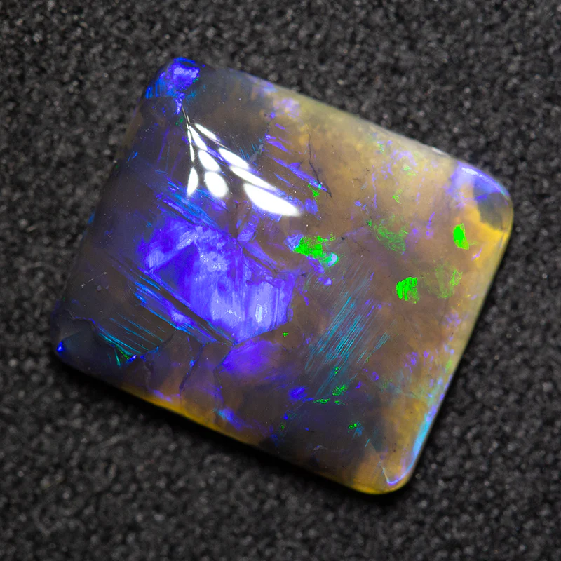 2.71 ct black opal 10.7x9.3x3.5mm