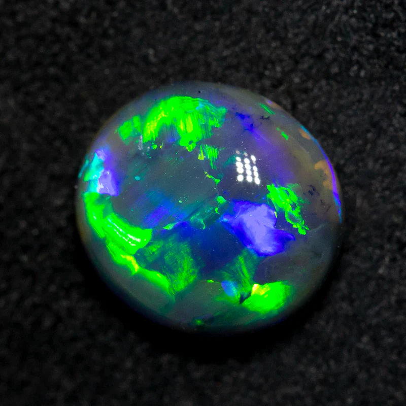 2.72 ct black opal 9.x9.1x5mm