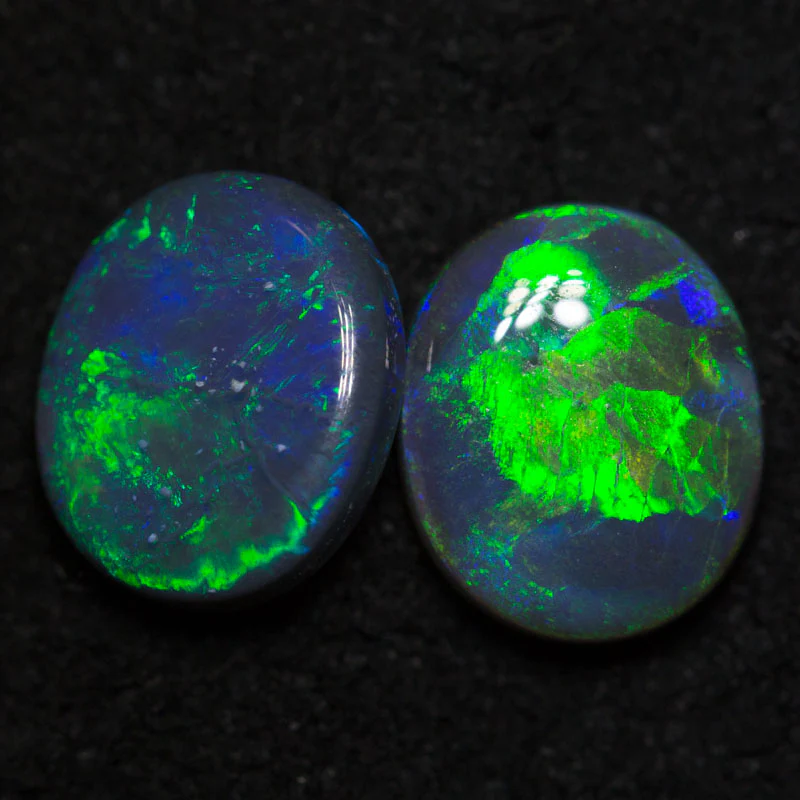 2.72 ct black opal pair 8.8x7.4x3mm