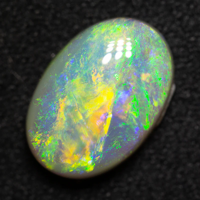 2.72 ct dark opal 11.3x7.9x4.2mm