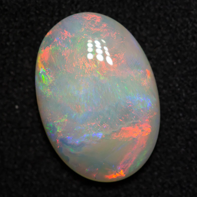 2.72 ct white opal 13x9.1x3.4mm