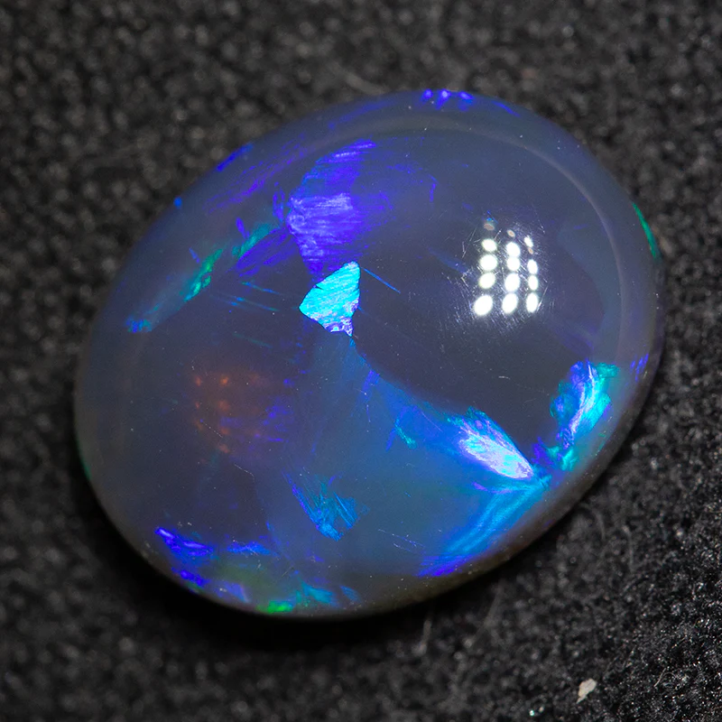 2.76 ct black opal 11x9x4.5mm