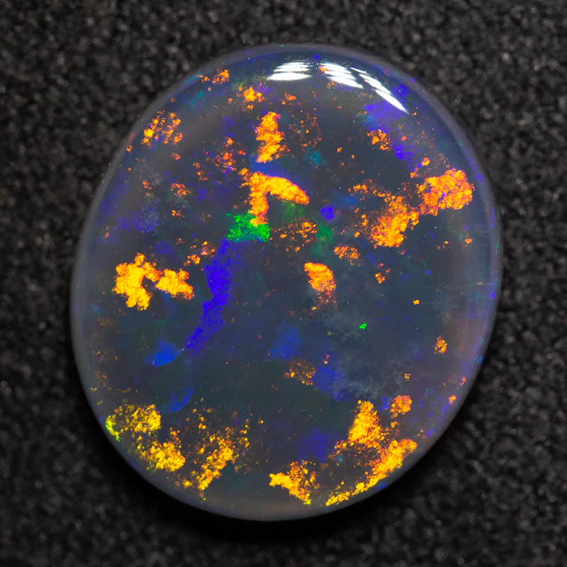 2.78 ct black opal 12x10.5x3mm
