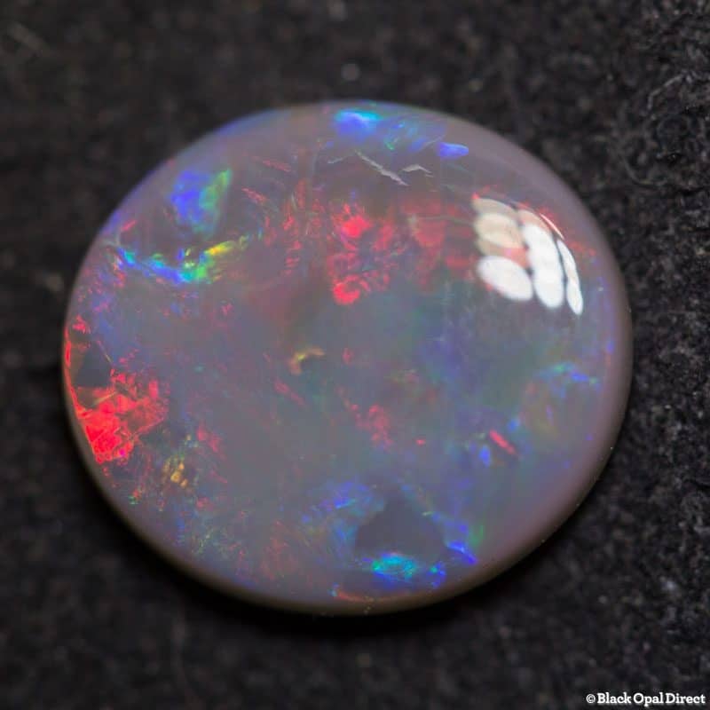 2.78 ct semi black opal 12x11x3mm