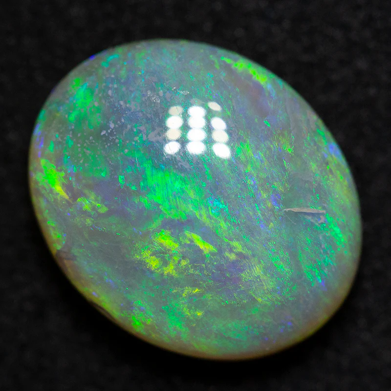 2.81 ct dark opal 11x9.1x4.5mm