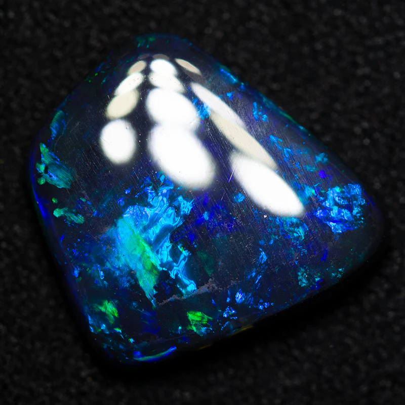 2.82 ct black opal 11.6x10.8x3.5mm