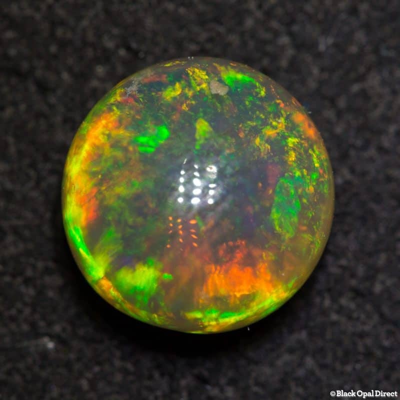 2.83 ct double sided crystal opal 8.5mm round x 6mm thick
