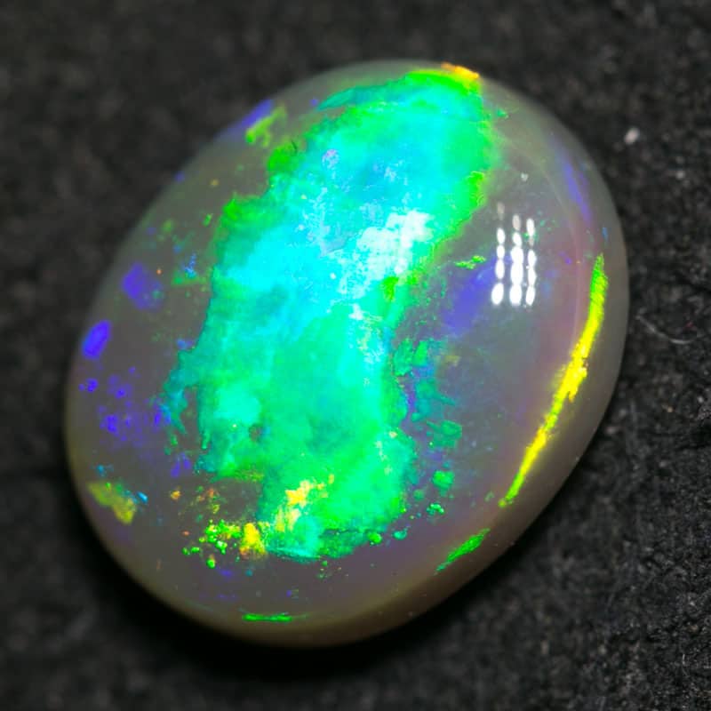2.84 ct dark opal 11x9x4.5mm