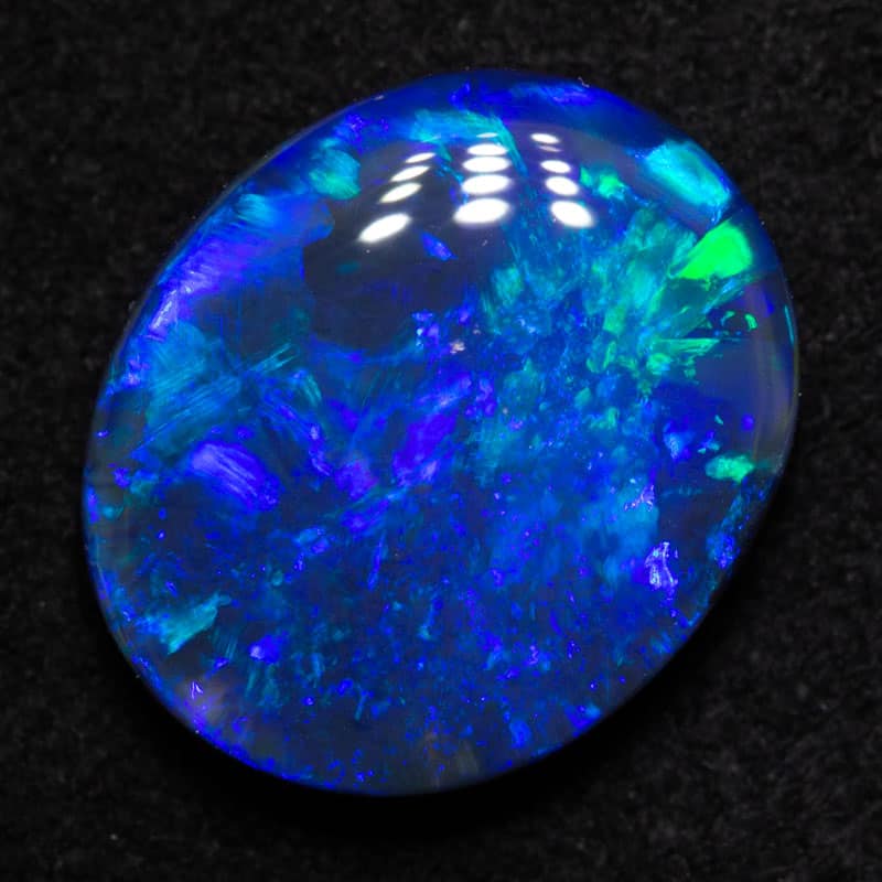 2.86 ct black opal 11.6x9.7x3.9mm