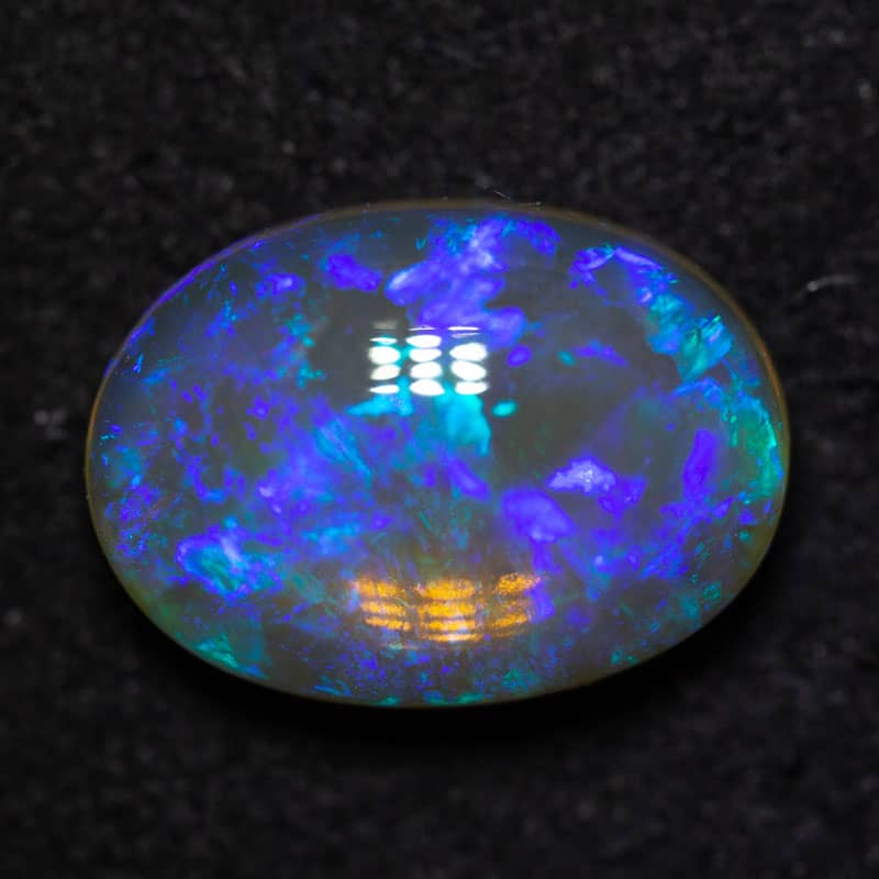 2.87 ct dark crystal opal 12x8.5x4mm