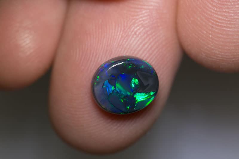2.90 ct black opal 10x9x4mm