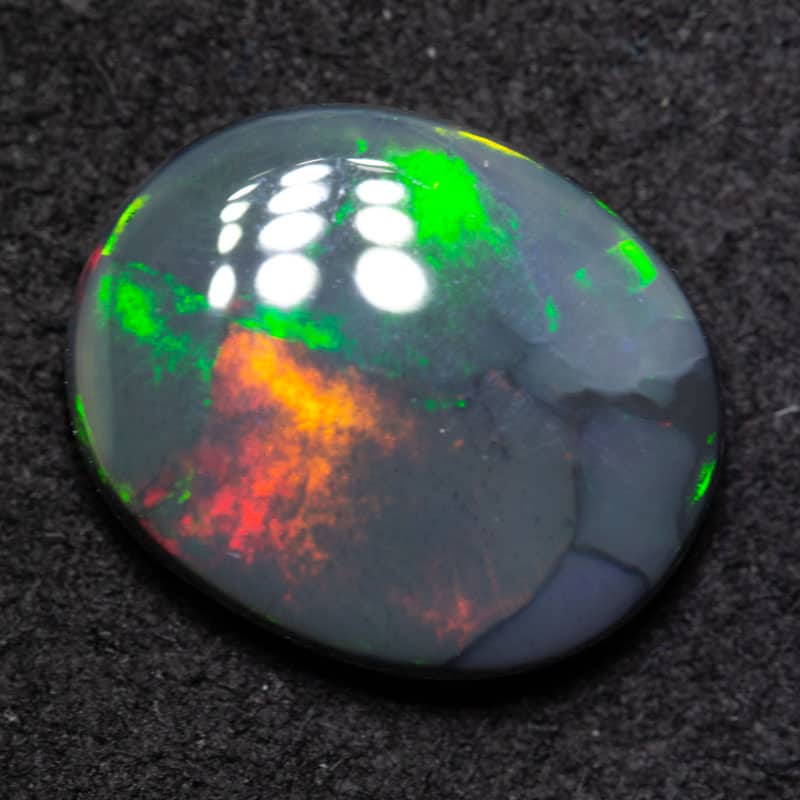 2.90 ct black opal 12.1x10x3.6mm