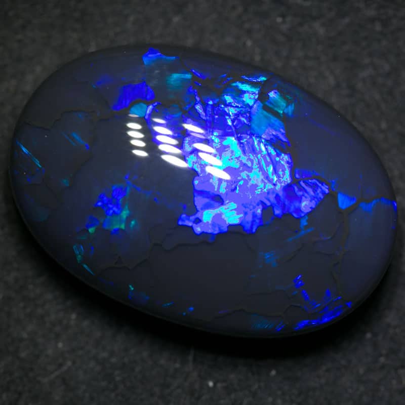 20.62 ct black opal 22.5x15x9mm