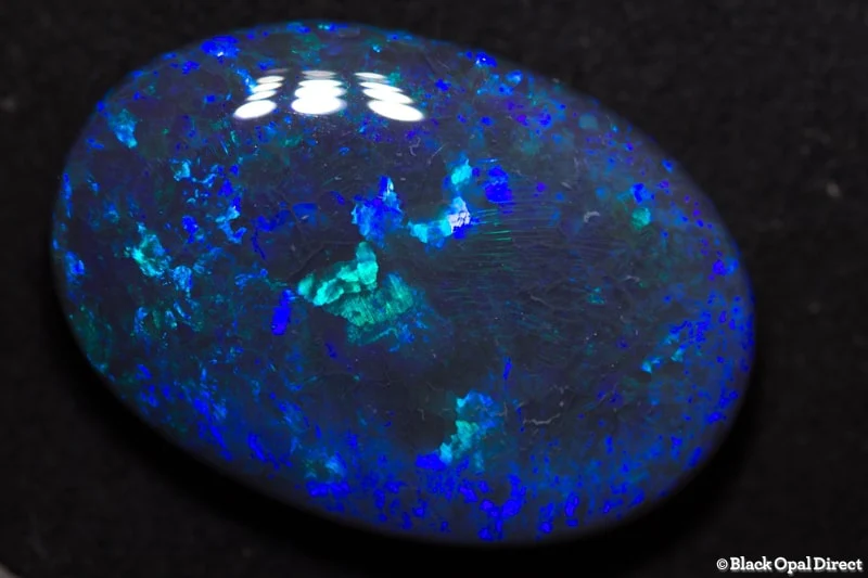 21.77 ct black opal 26x18x7.5mm