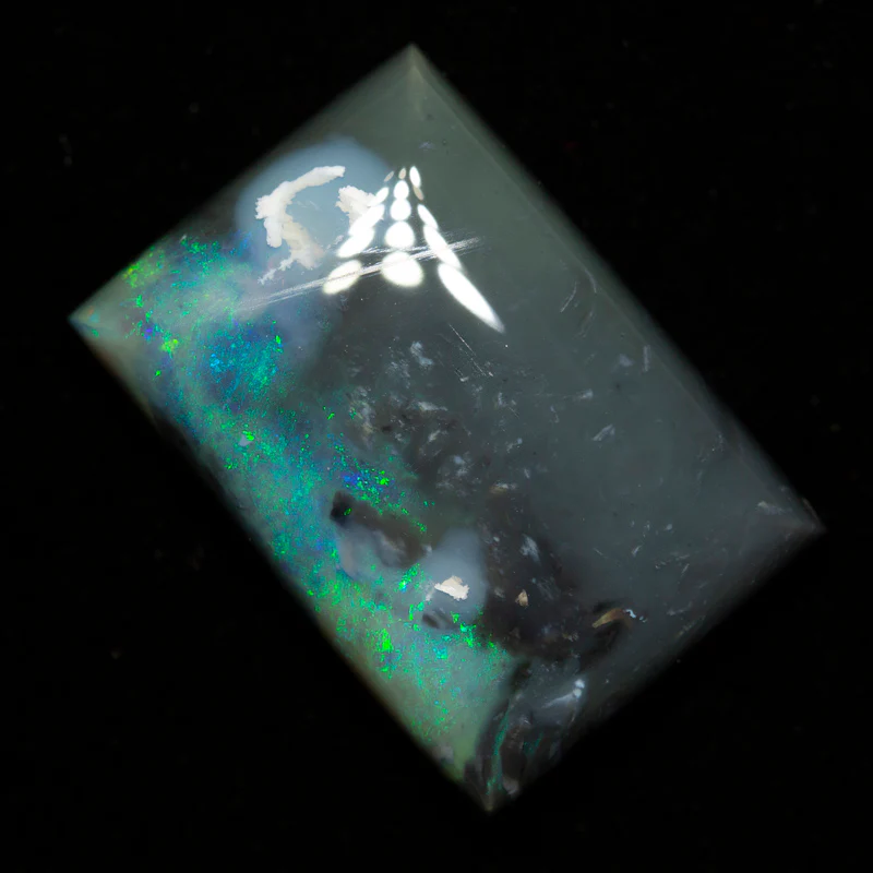 25.05 ct black opal 23.5x16.3x7.3mm