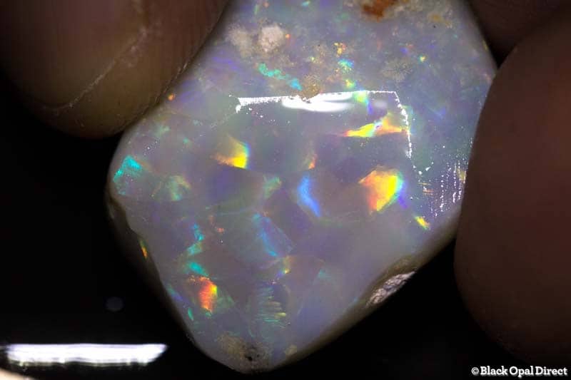 26.50 ct rough opal piece harlequin pattern 29mm across