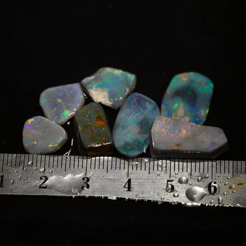 26 ct rough and rubbed opal parcel 7pc