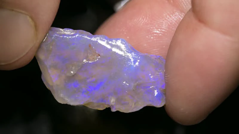 27.22 ct roughly rubbed opal piece 33mm across
