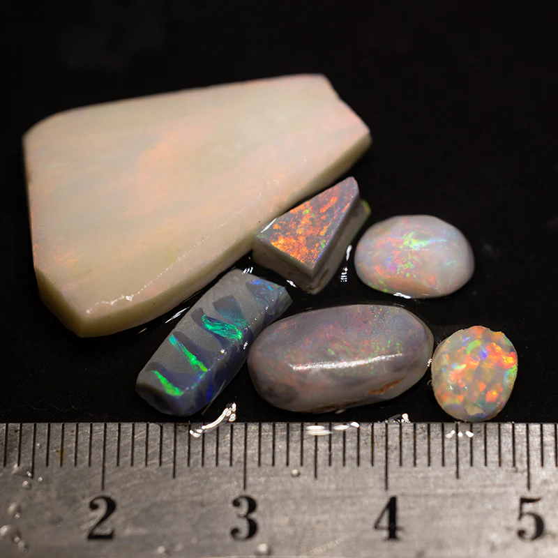 27.29 ct opal rubs parcel 6pc