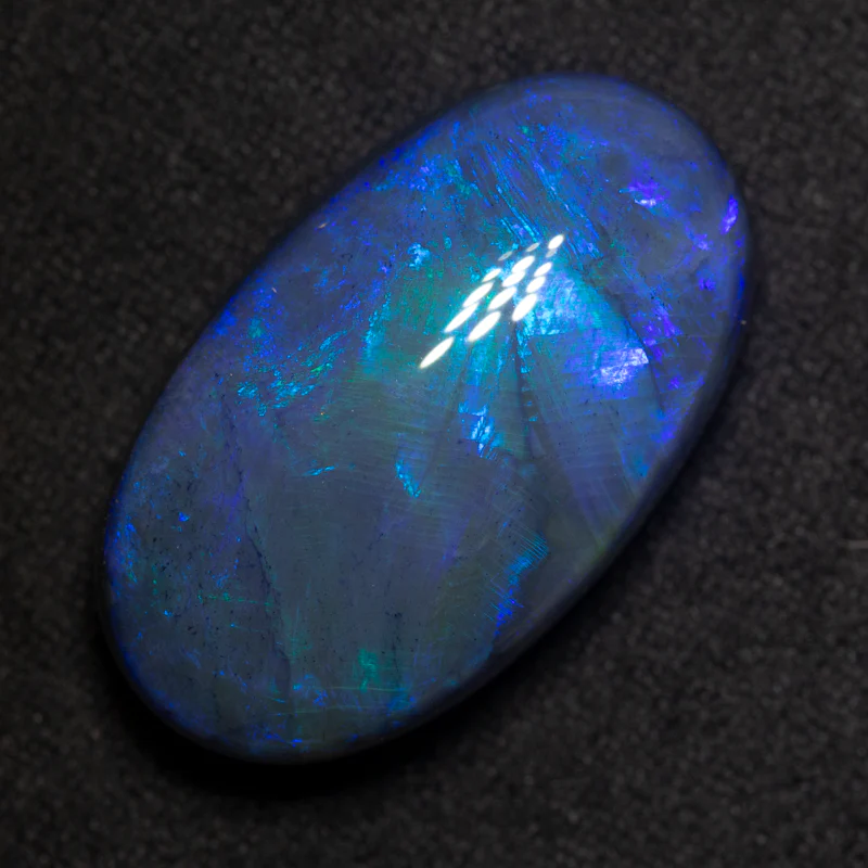 27.52 ct black opal 27x15.5x10.3mm