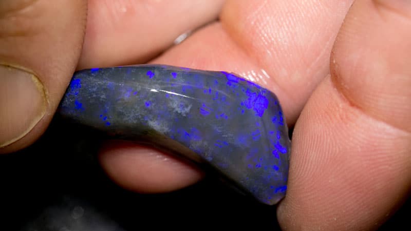 27.95 ct roughly rubbed opal piece 36mm across