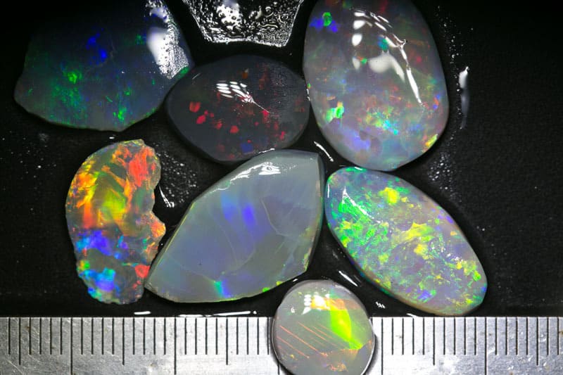 28 ct rubbed opal parcel 7pc