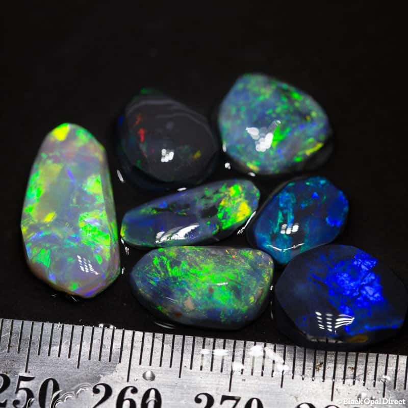 29.74 ct opal rubs 7 pieces