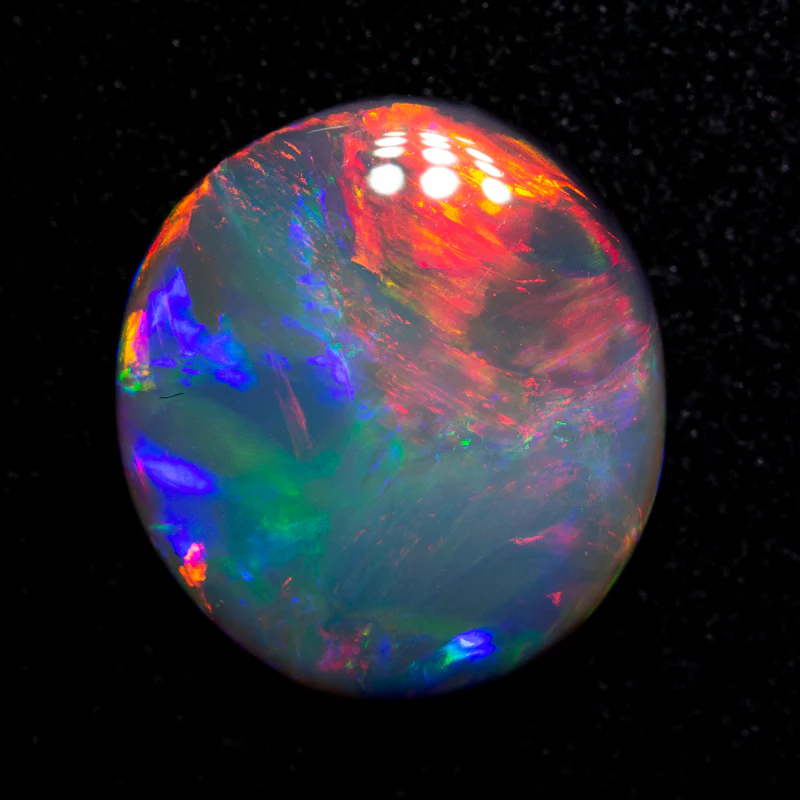 3.00 ct black opal 12x11x3.5 mm