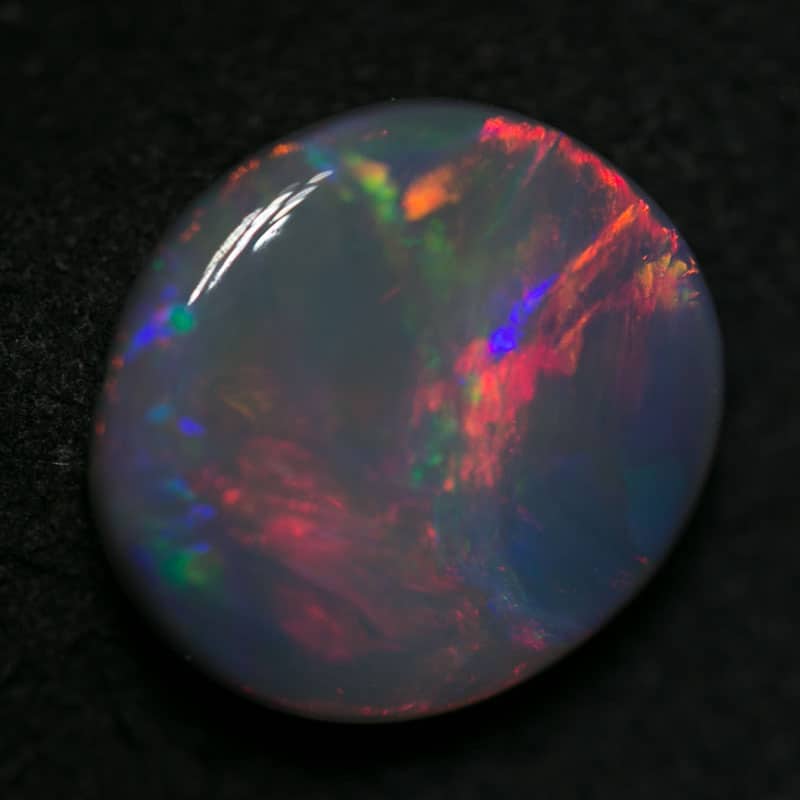 3.00 ct black opal gem 12x11x3.5mm