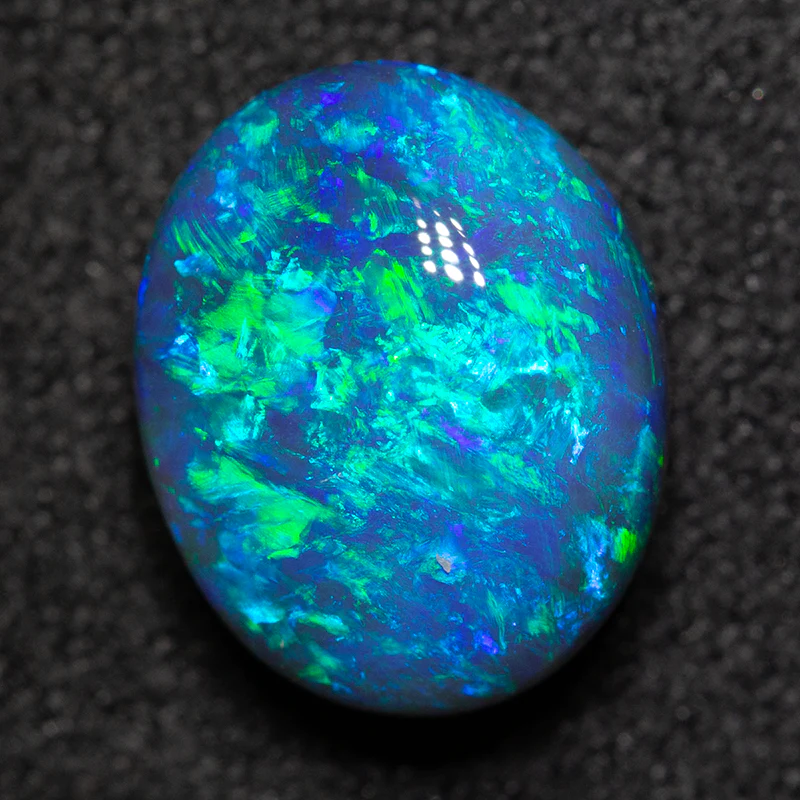 3.16 ct double-sided black crystal opal 10.4x8.4x6mm