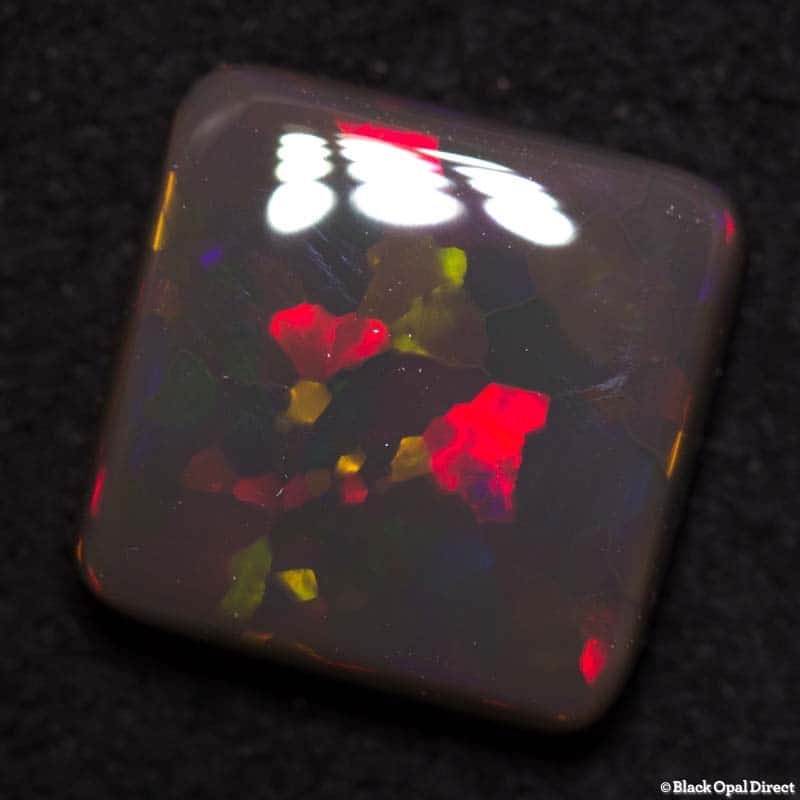 3.18 ct black opal cushion cut 10x10x3mm