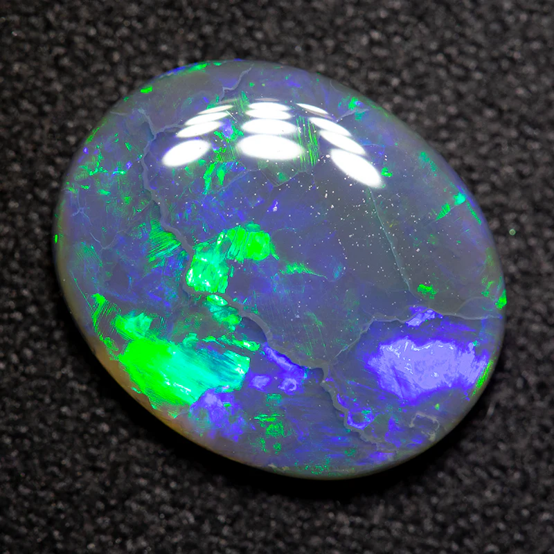 3.21 ct black opal 12.9x10.5x3.2mm