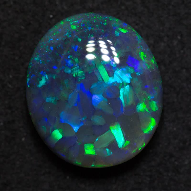 3.21 ct double sided black opal 10.9x9.6x4.6mm