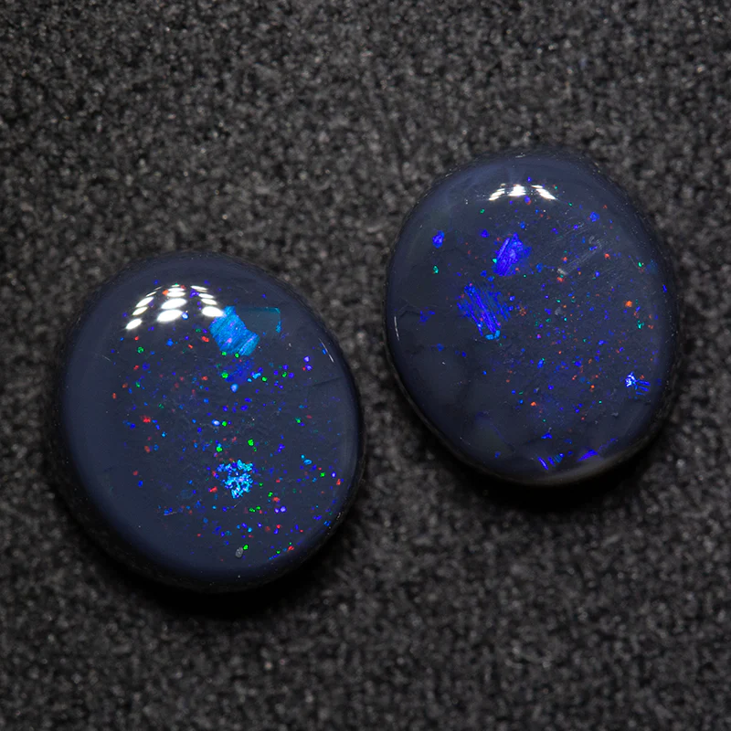 3.24 ct black opal pair 8.1x7.3x4.1mm