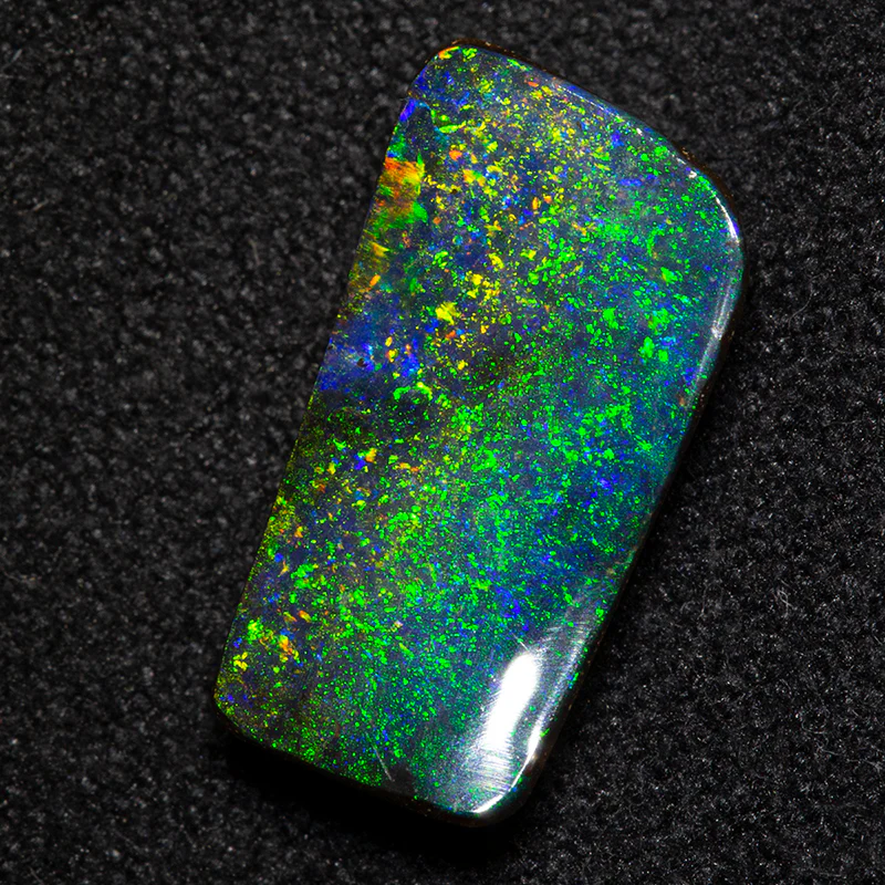 3.28 ct boulder opal 13.3x7.2x3.4mm
