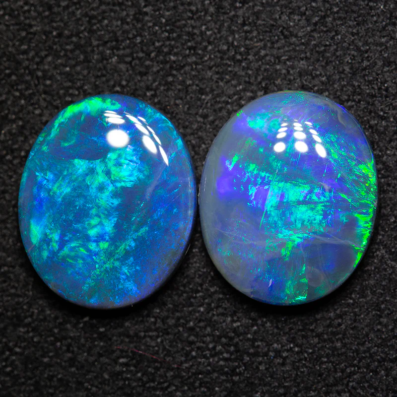 3.35 ct black opal pair 10x8.4x3.2mm
